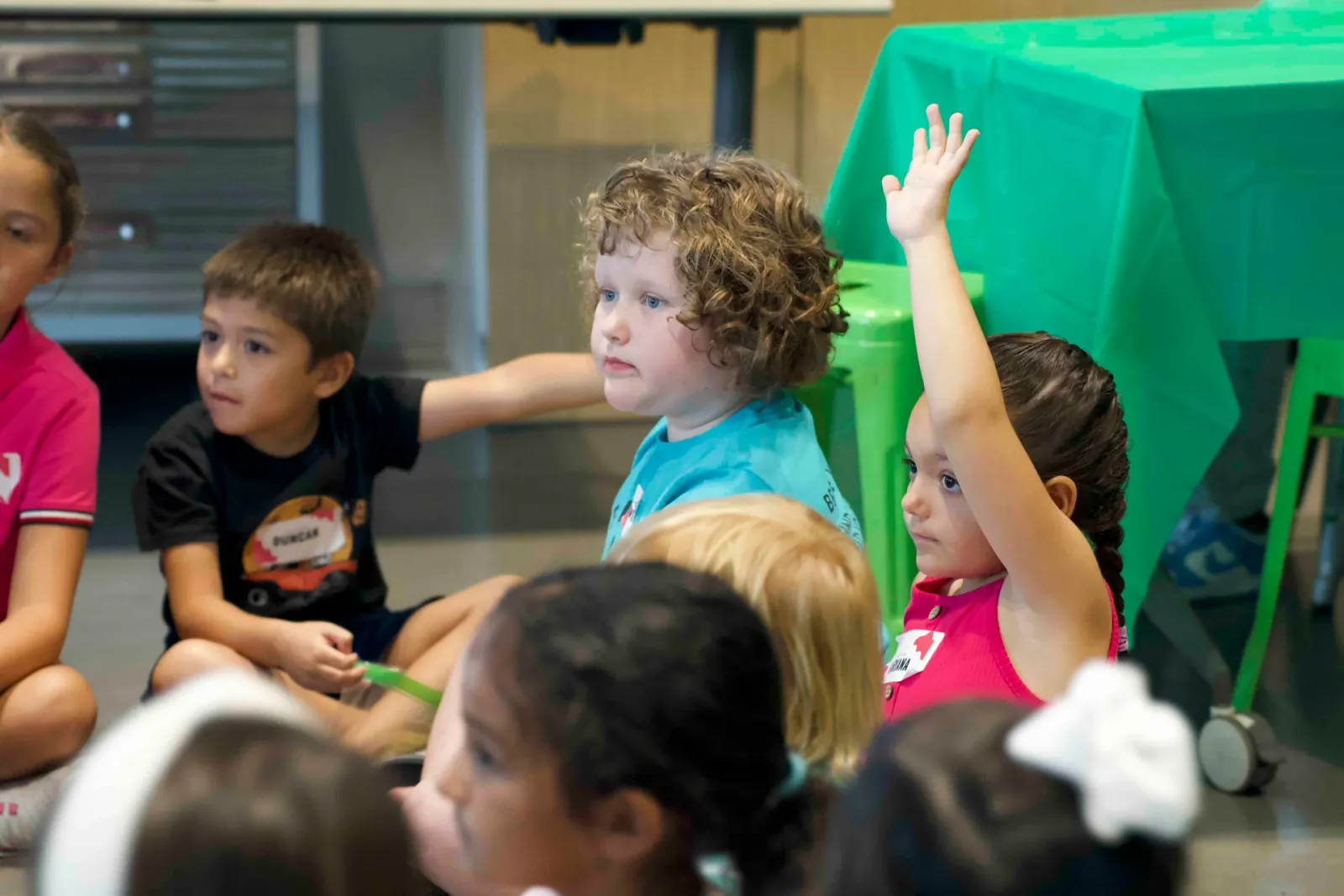 A native Spanish-speaking LingoStars instructor working closely with a child